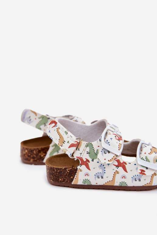 Vaikiškos basutės Ant kamštinio pado su sagtimis Dinozaurasai įvairių spalvų Thessa Vaikiškos basutės Ant kamštinio pado su sagtimis Dinozaurasai įvairių spalvų Thessa