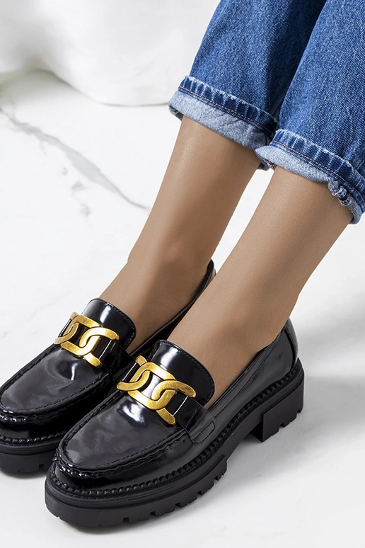 Juodi bateliai ant platformos, „Birkett"