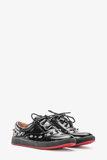 Juodos lakuotos odos Fatna...