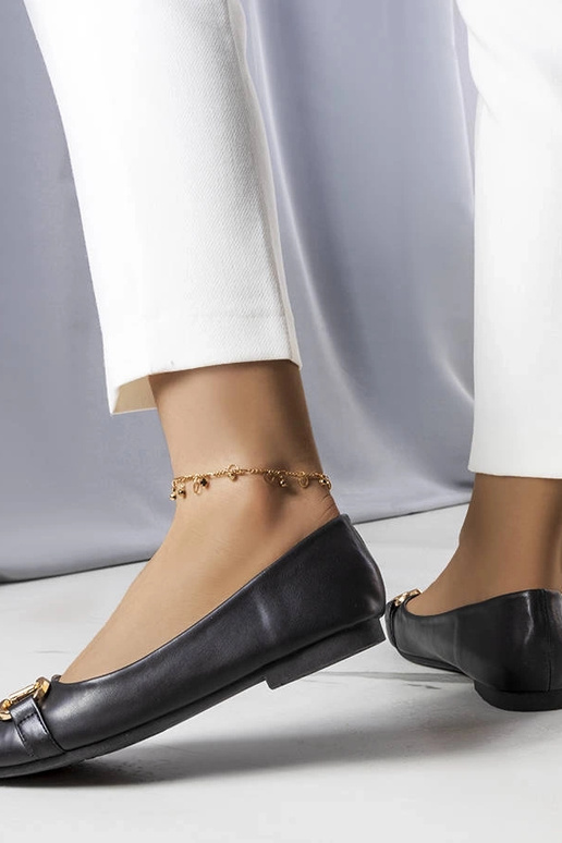 Juodi baleto buteliai su auksine Iris...