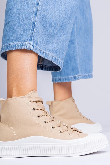 Žali aukšti bateliai ant... 2