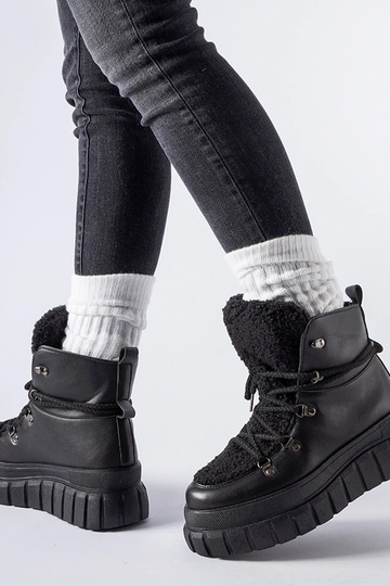 Juodi kulkšnies batai ant... 2