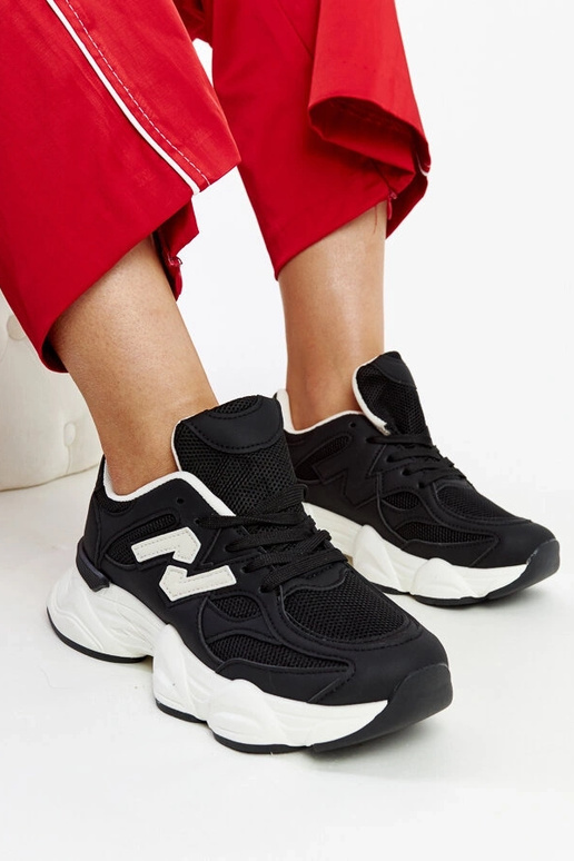 Juodi sportbačiai su masyviu Gergely...