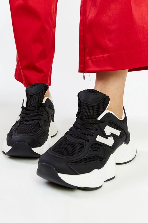 Juodi sportbačiai su masyviu Gergely...