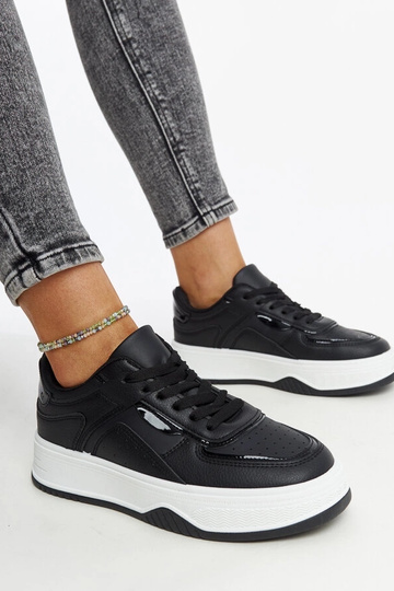 Juodi sportbačiai storesniu...