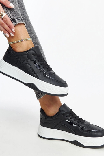 Juodi sportbačiai storesniu... 2