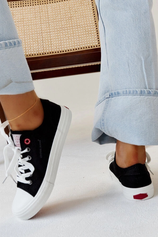 Juodo audinio moteriški sportbačiai...