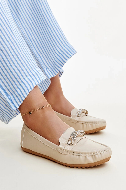 Smėlio spalvos mokasinai dekoruoti...