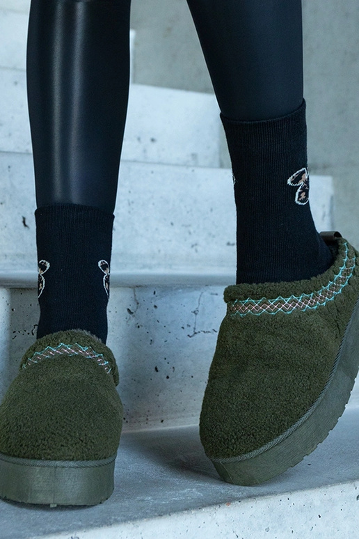 Žali žemi platforminiai sniego batai...