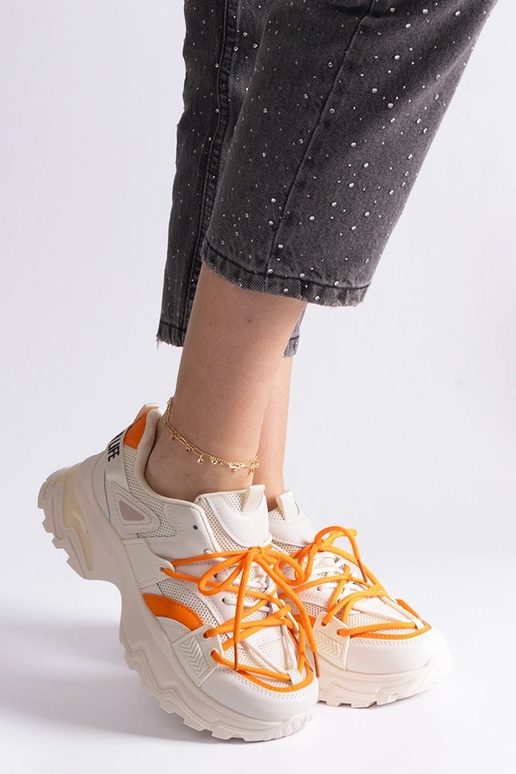 Smėlio spalvos sportiniai sportbačiai...