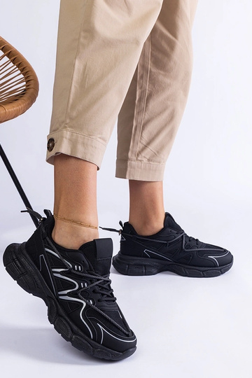 Juodi moteriški sportbačiai... 2