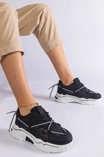 Juodi moteriški sportbačiai...