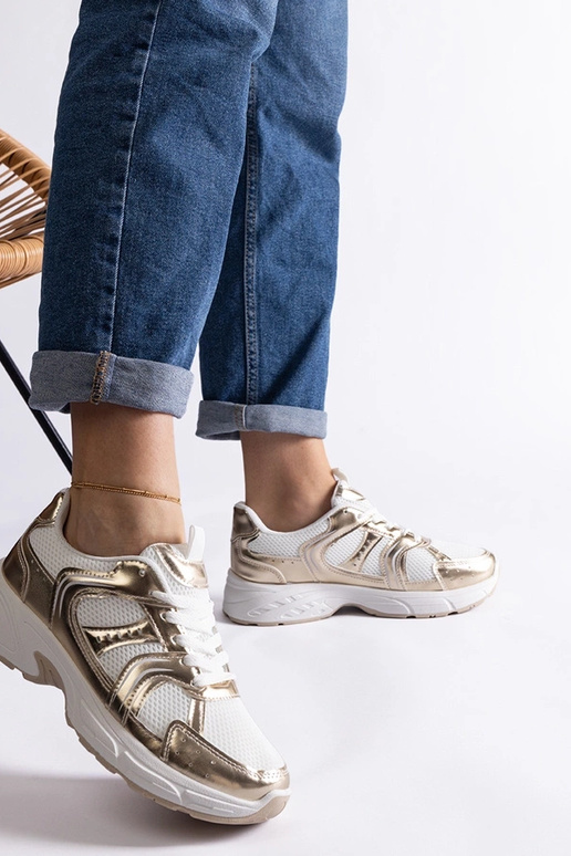 Baltos ir auksinės spalvos Ena...