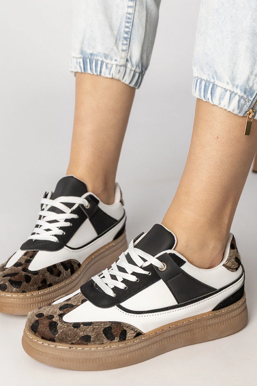 Balti-juodi sportiniai bateliai su...