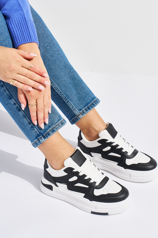 Baltos-juodos spalvos Sneakers...