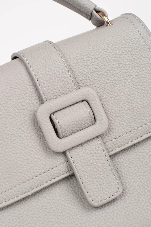 Pilka mažai rankinė su auksiniais...