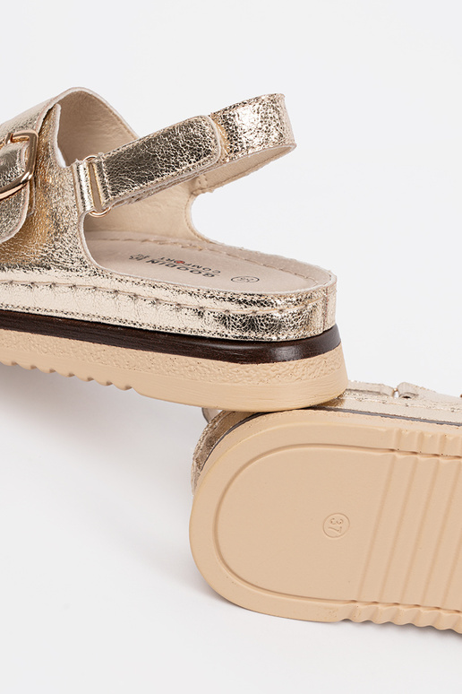 Aukso spalvos sandalai su auksiniais...