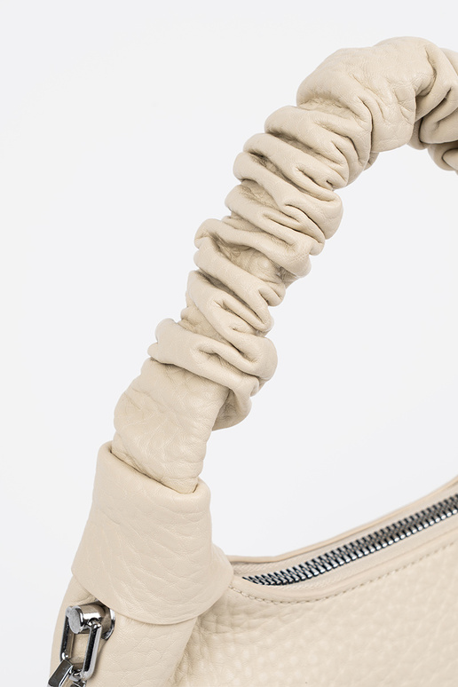 Mėlyna rankinė su dekoratyviu šaliu