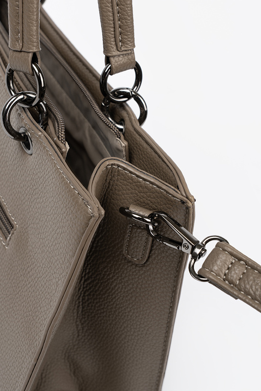 FakturoĮana rankinė z designerskim akcentem