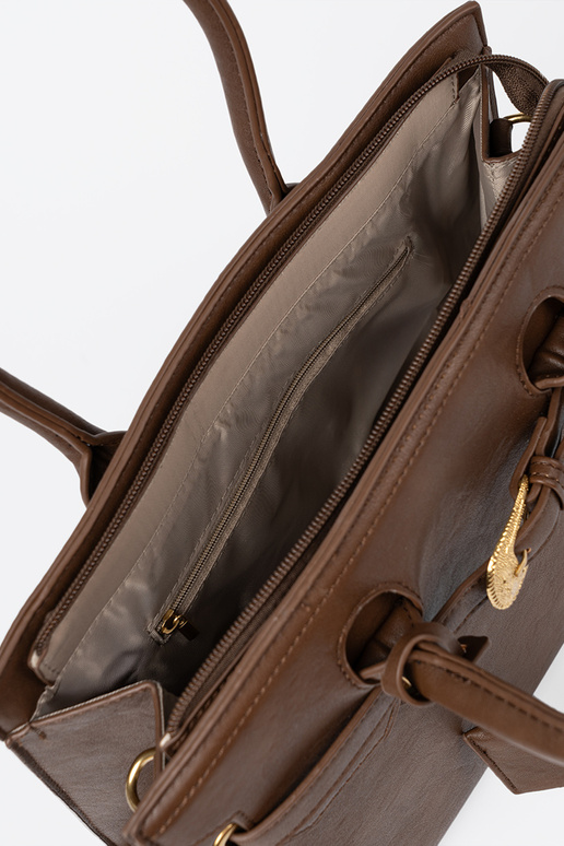 ruda rankinė su dekoratyvine sagtimi Į auksinism kolorze