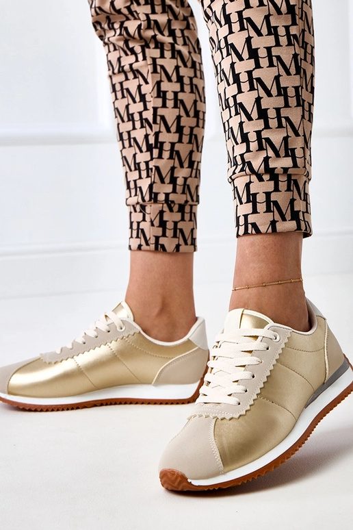 Smėlio spalvos sportiniai sportbačiai...