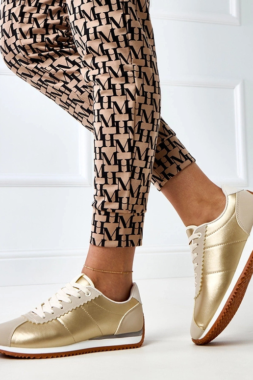 Smėlio spalvos sportiniai sportbačiai...