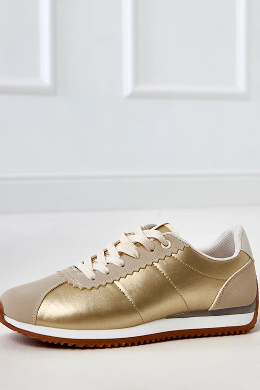 Smėlio spalvos sportiniai sportbačiai...