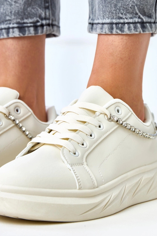 Smėlio spalvos sportbačiai ant...