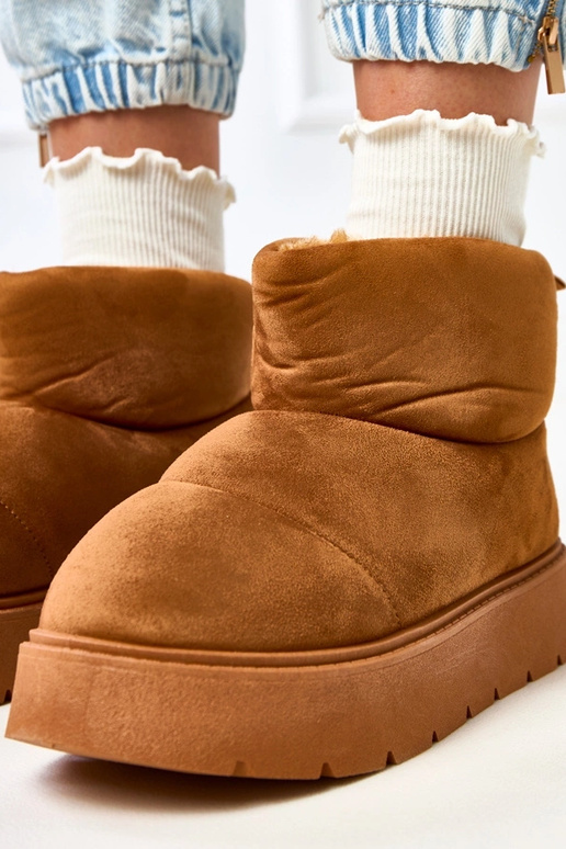 Rudi šilti sniego batai ant...