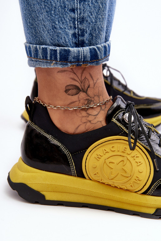 Moteriškas sportiniai bateliai Oda Tai turiciejka 06295-01 Juodos ir-geltonos spalvos Moteriškas sportiniai bateliai Oda Tai turiciejka 06295-01 Juodos ir-geltonos spalvos