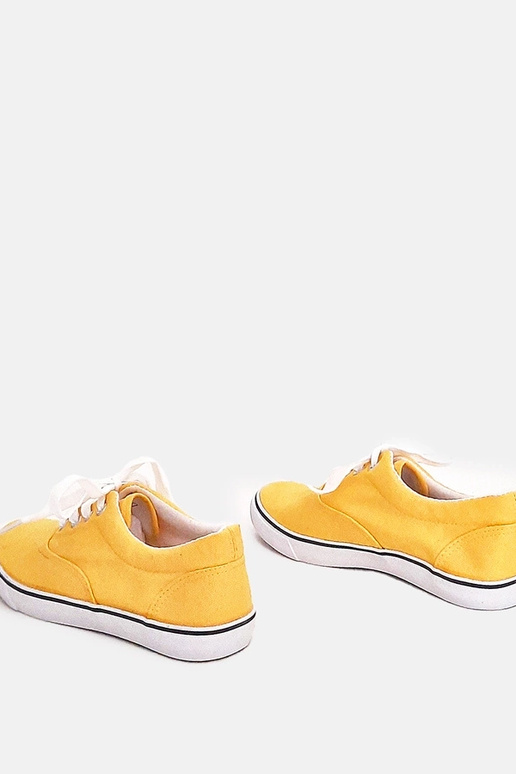 Geltoni vaikiški sportiniai bateliai...