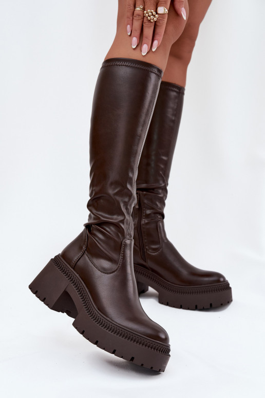 Moteriški ilgaauliai batai ant masyvių kulnų ir platformos įsispiriamo modelio rudos spalvos Florinne