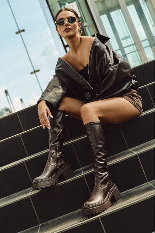 Moteriški ilgaauliai batai ant masyvių kulnų ir platformos įsispiriamo modelio rudos spalvos Florinne