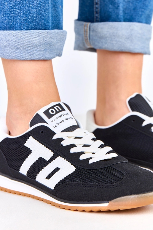 Juodi sportiniai bateliai su baltais...