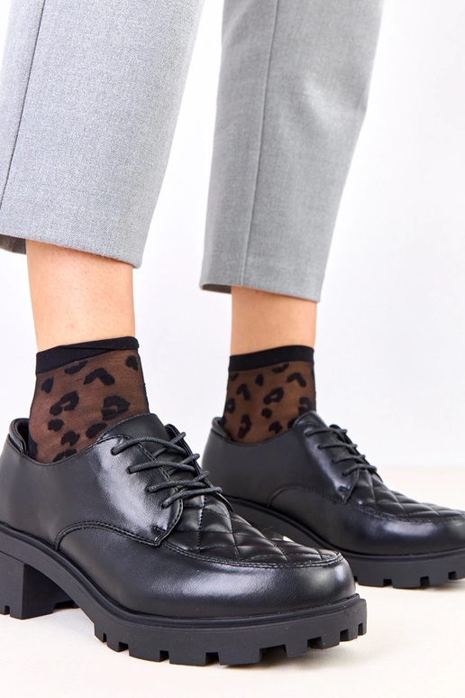 Juodi pusbačiai su dygsniuota įsiuva...