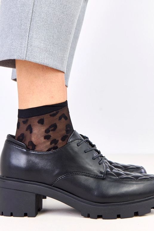 Juodi pusbačiai su dygsniuota įsiuva...