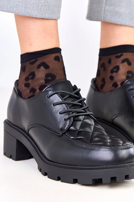 Juodi pusbačiai su dygsniuota įsiuva...