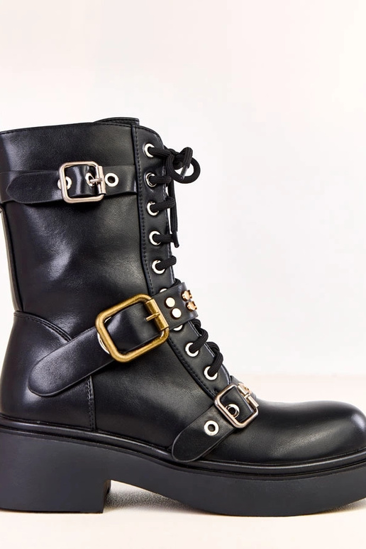 Juodi moteriški auliniai batai puošti...