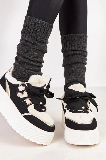 Juodi šildyti sportbačiai... 2