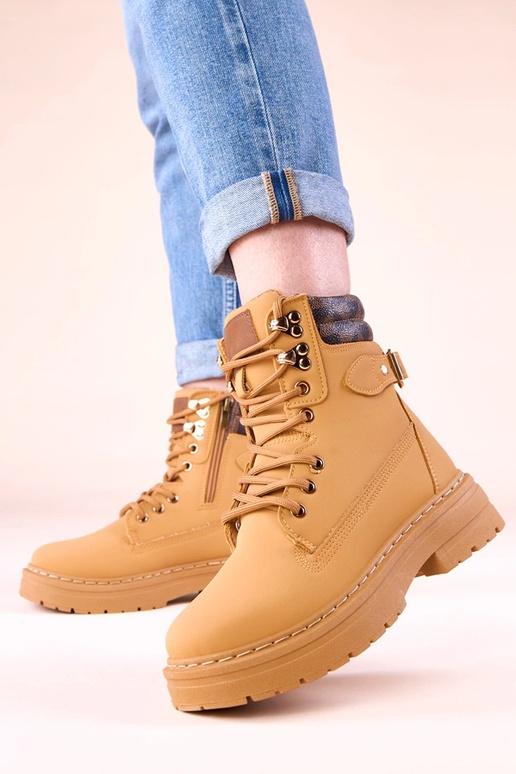 Rudos šiltos traperės iš matinės...