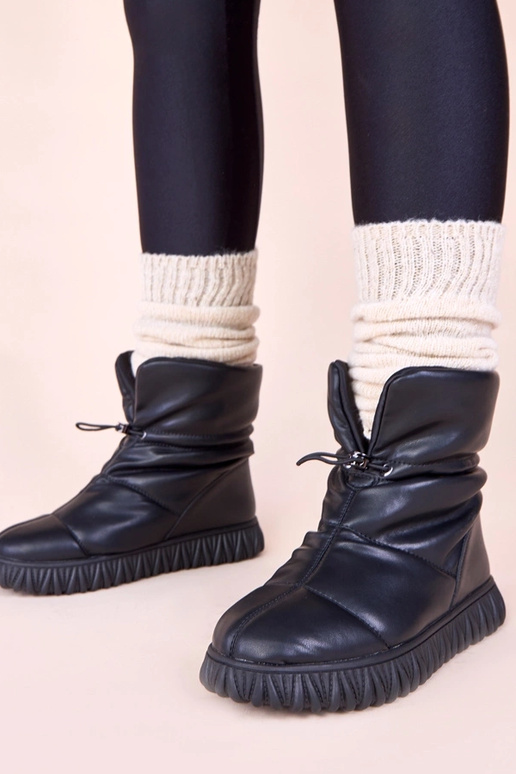 Juodi sniego batai iš natūralios odos...