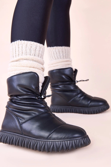 Juodi sniego batai iš... 2