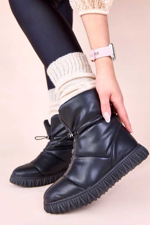 Juodi sniego batai iš natūralios odos...