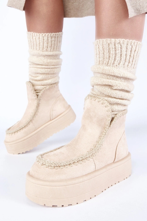 Šviesiai smėlio spalvos sniego batai...