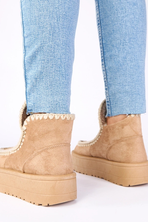 Tamsiai smėlinės spalvos sniego batai...