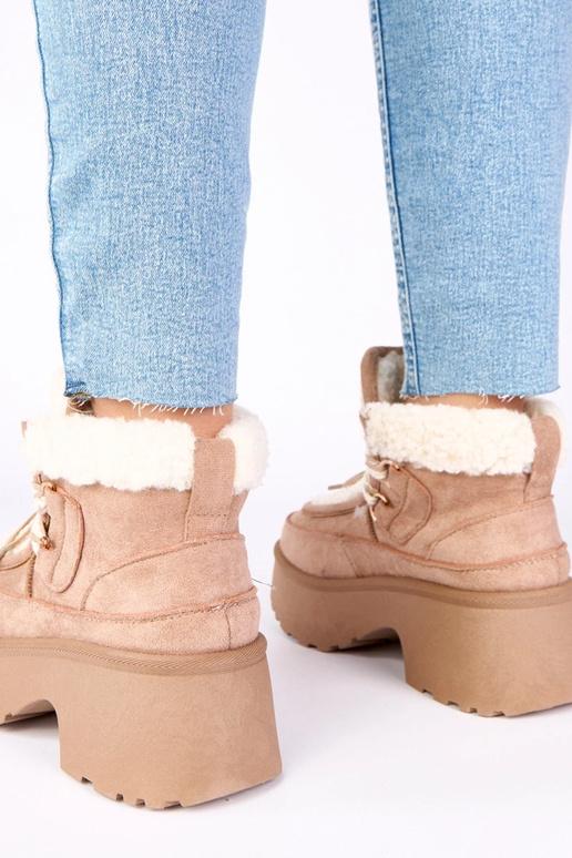 Tamsiai smėlinės spalvos sniego batai...