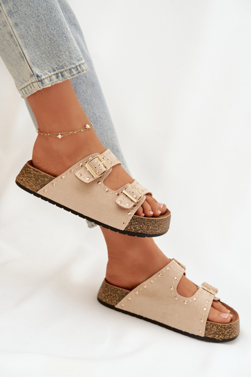 Moteriškos šlepetės Ze aukso spalvosmi su sagtimismi Ir smeigės dramblio kaulo spalvos Tervina