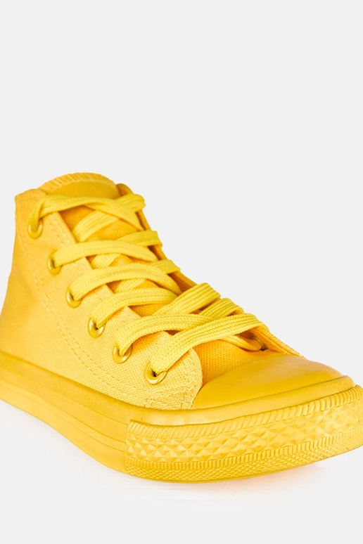 Geltoni vaikų sportbačiai virš...