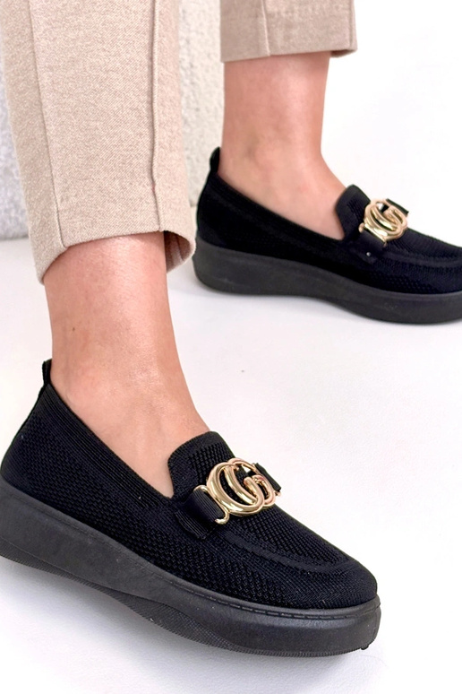 Juodi įmaunami audiniai sportbačiai...