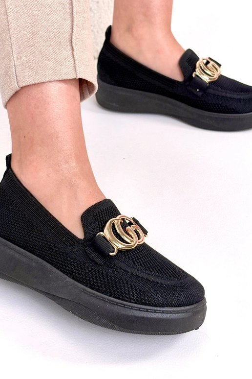 Juodi įmaunami audiniai sportbačiai...